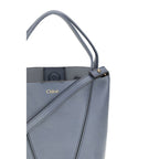 Shiny Grained Calf Leather Spin Shoulder Bag